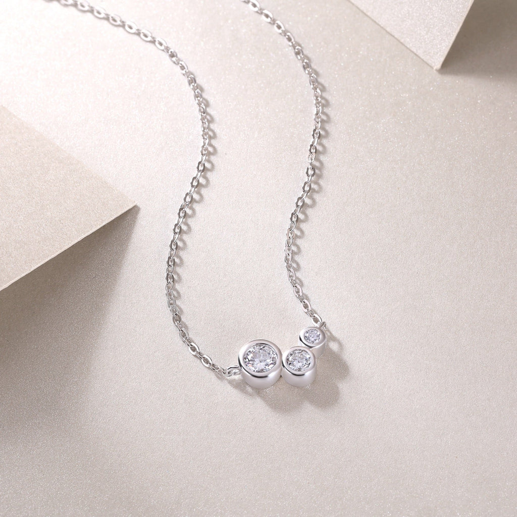 Dewfall Moissanite Three-Stone Necklace in Sterling Silver
