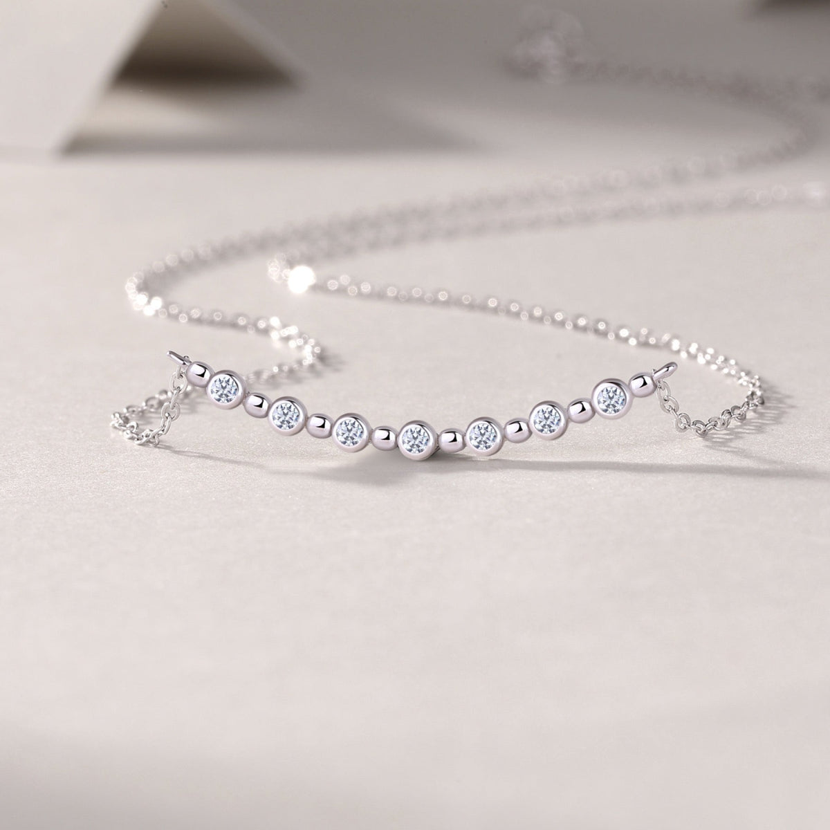 Constellation Moissanite Curved Bar Necklace in Sterling Silver