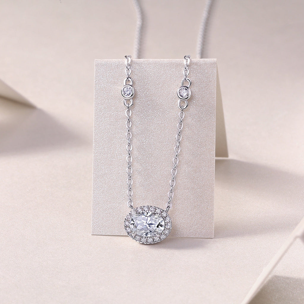 Midsummer Oval-Cut Moissanite Bezel Pendant Necklace in Sterling Silver