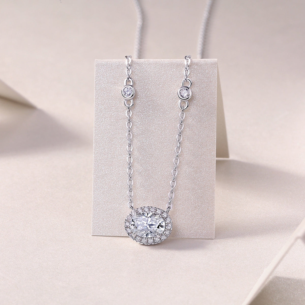 Midsummer Oval-Cut Moissanite Bezel Pendant Necklace in Sterling Silver