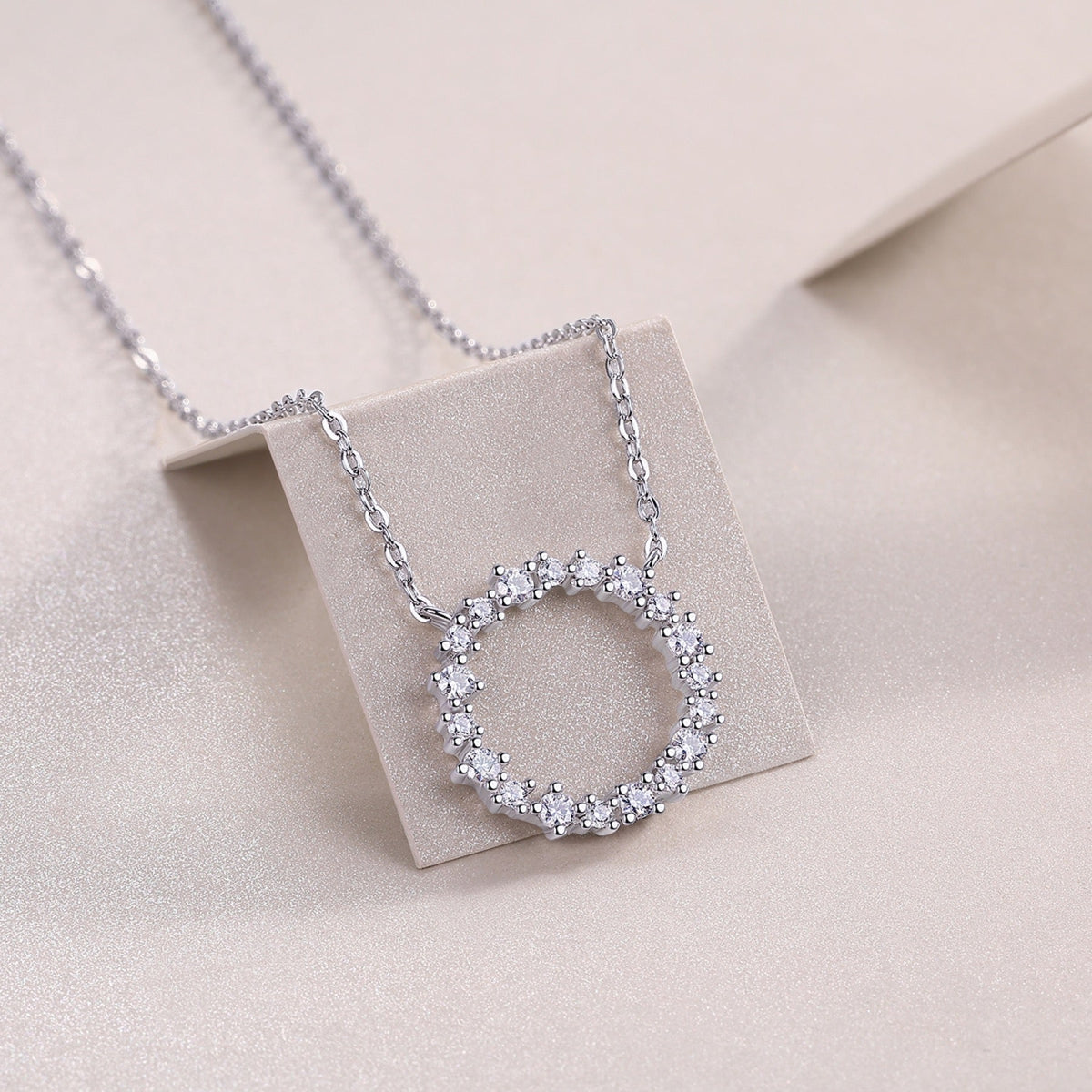 Ripple Moissanite Open Circle Necklace in Sterling Silver