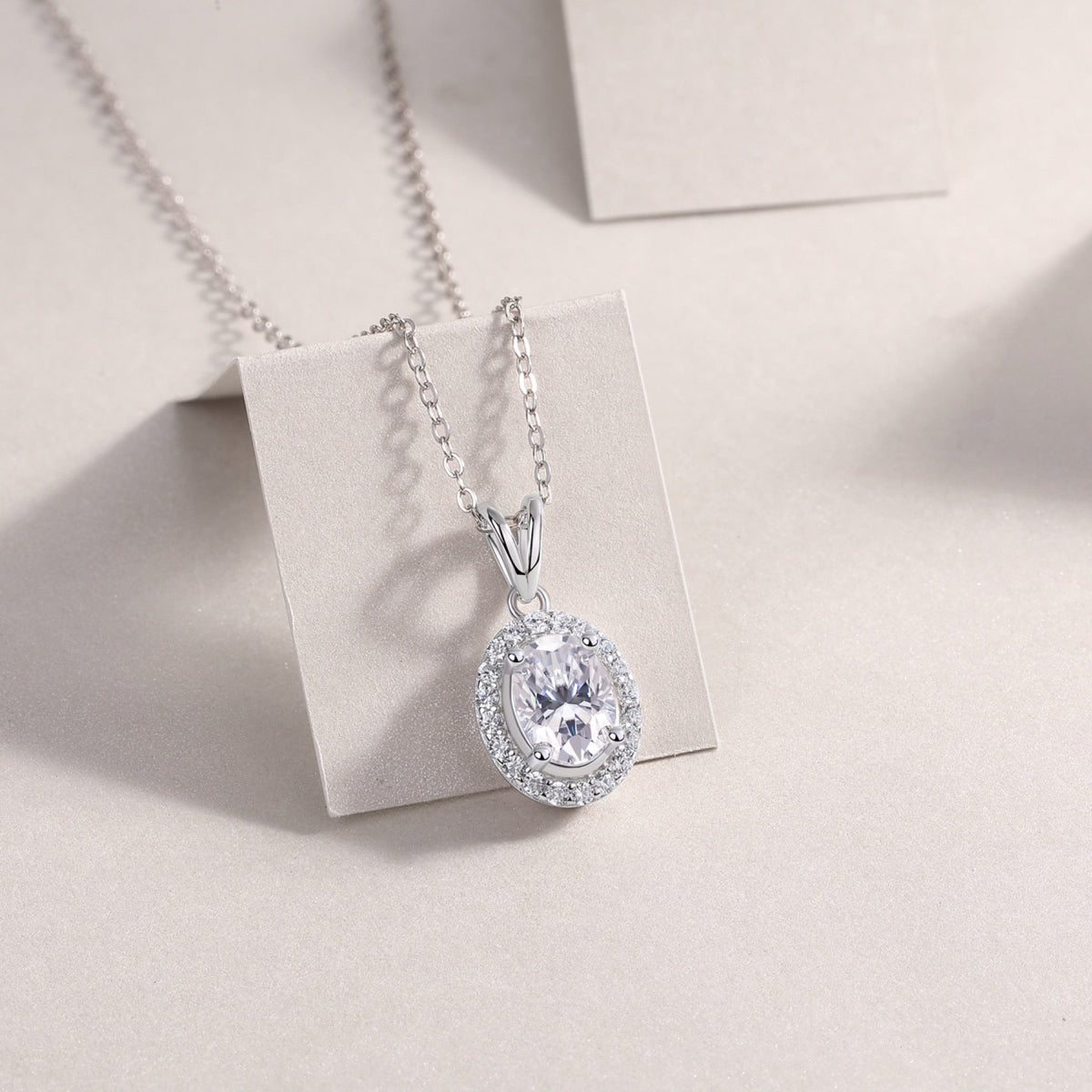 Verona Oval-Cut Moissanite Halo Pendant Necklace in Sterling Silver