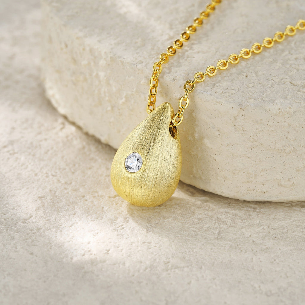 Reverie Moissanite Teardrop Pendant Necklace in Gold-Tone Sterling Silver