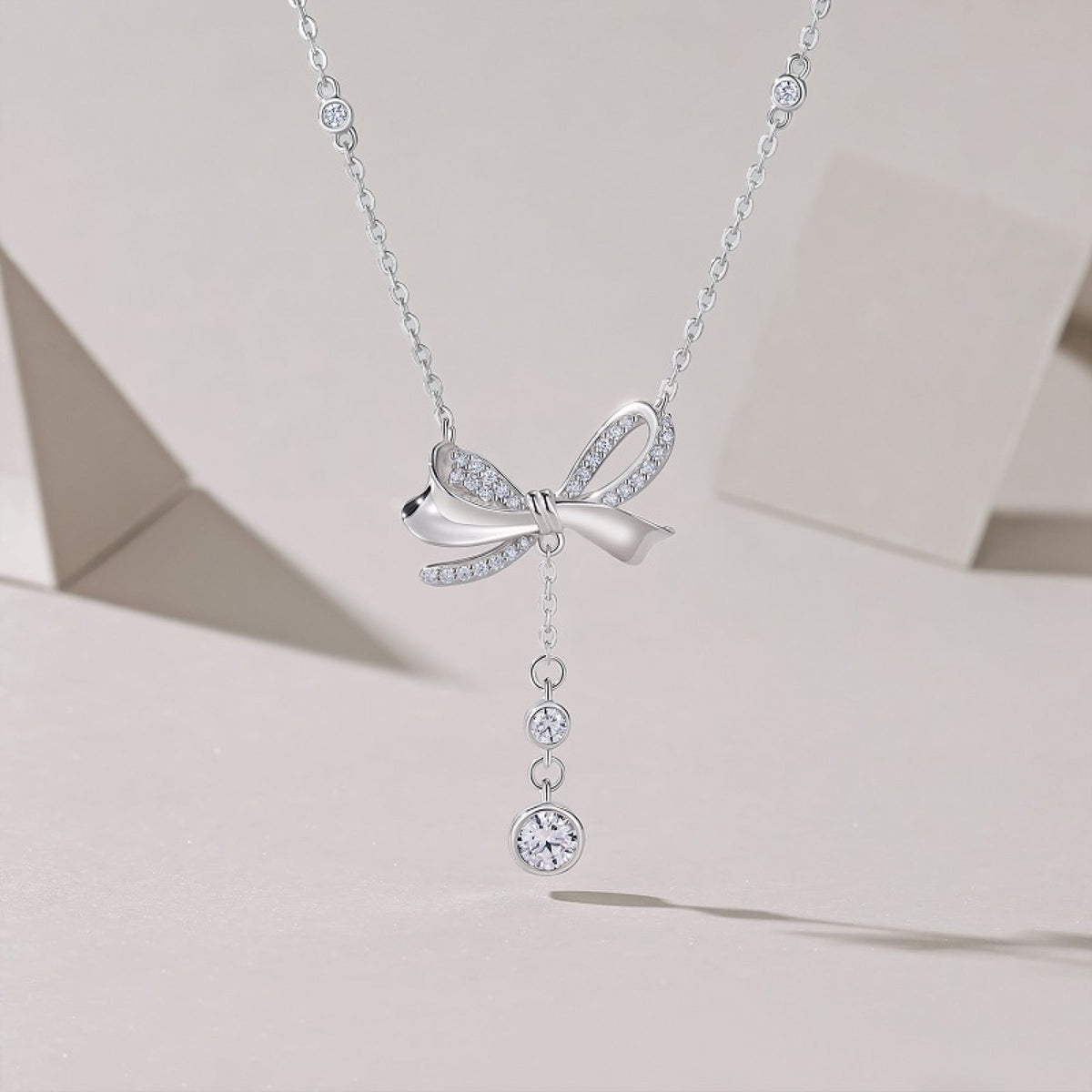 Fleur Moissanite Bow Lariat Necklace in Sterling Silver