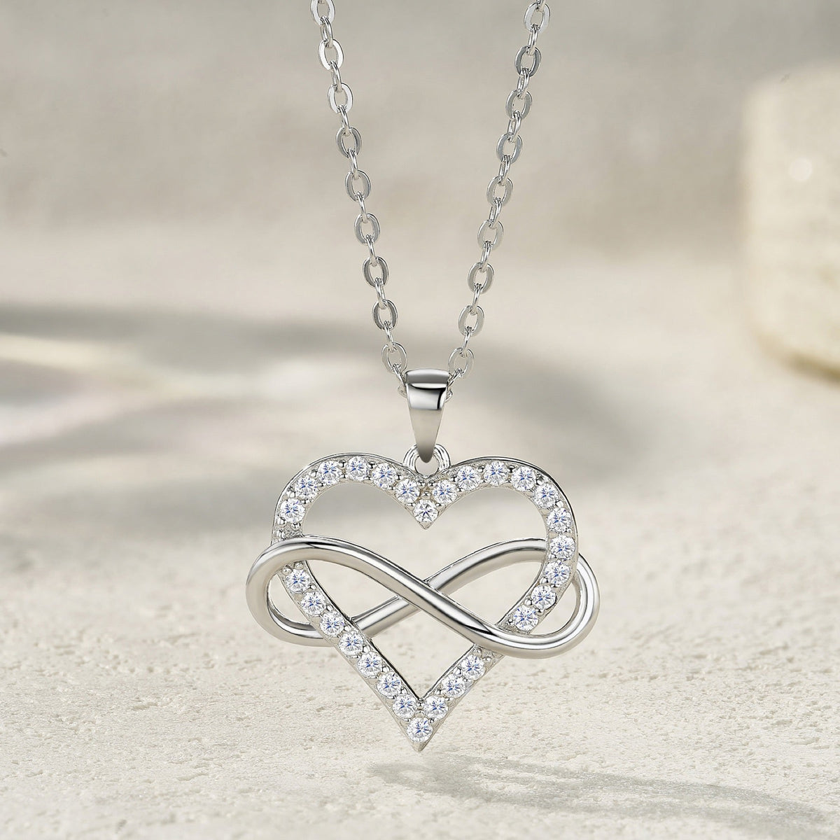 Infinity Moissanite Infinity Heart Necklace in Sterling Silver