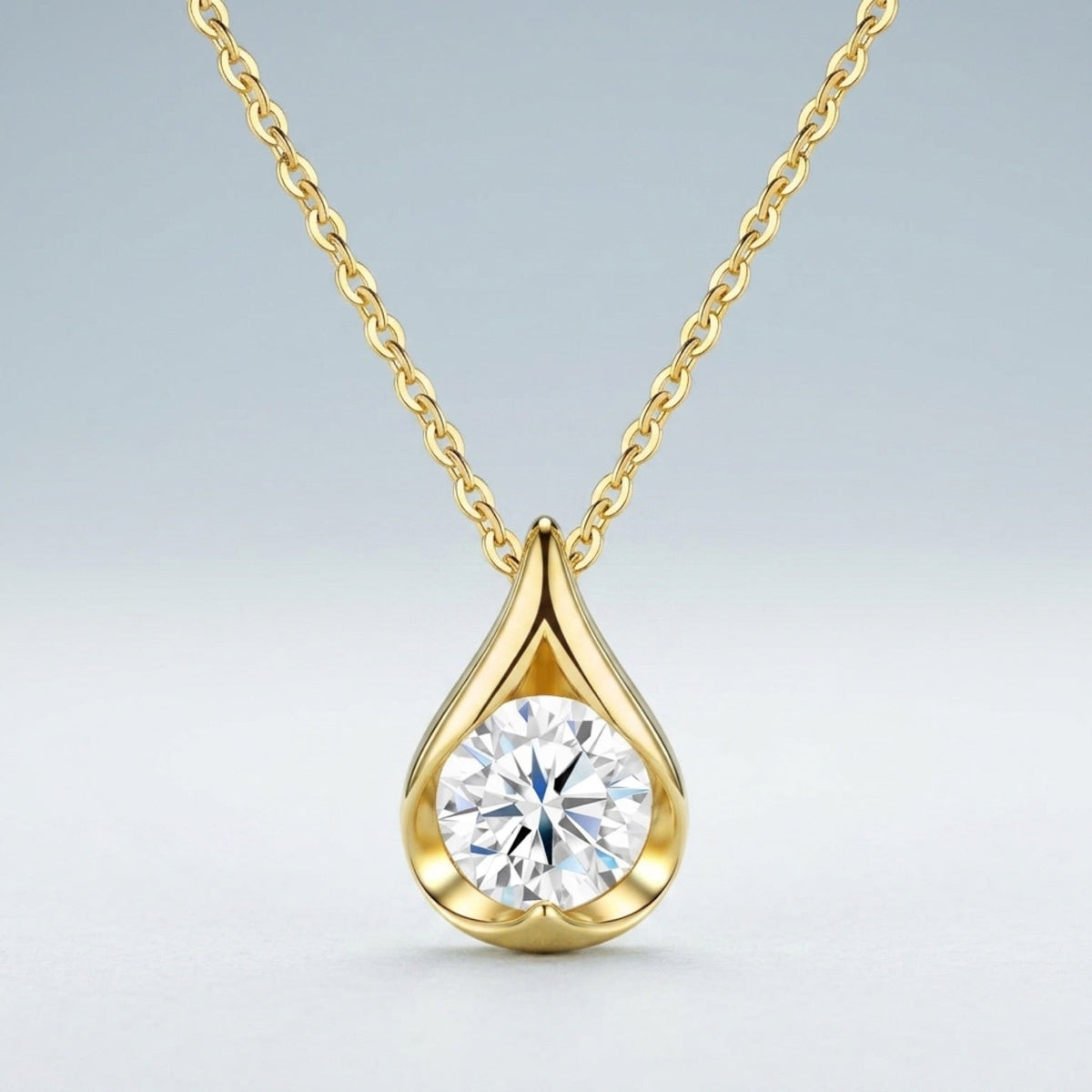 Sole 2 Carat Moissanite Teardrop Pendant Necklace in Gold-Tone Sterling Silver