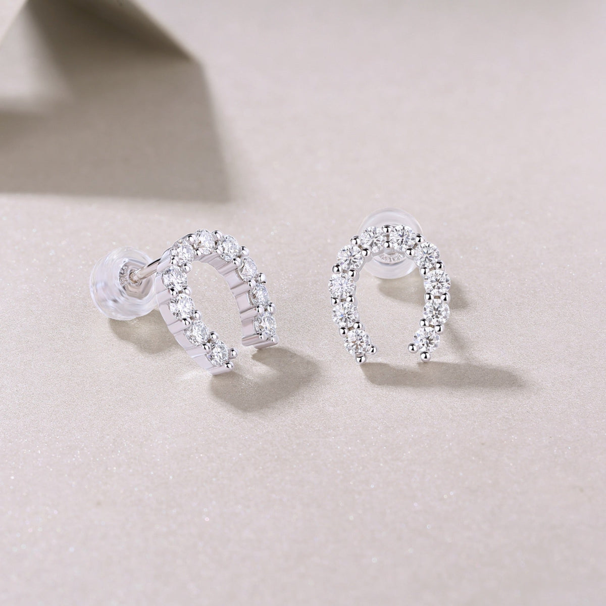 Charmed Moissanite Horseshoe Stud Earrings in Sterling Silver