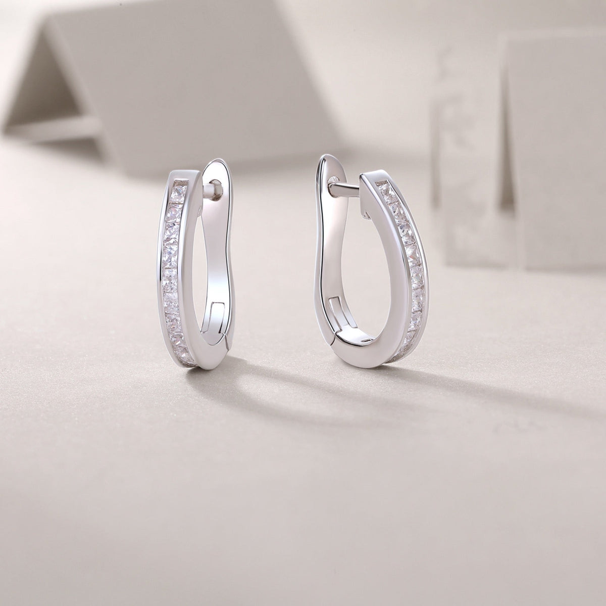 Arch Moissanite Baguette Huggie Hoop Earrings in Sterling Silver