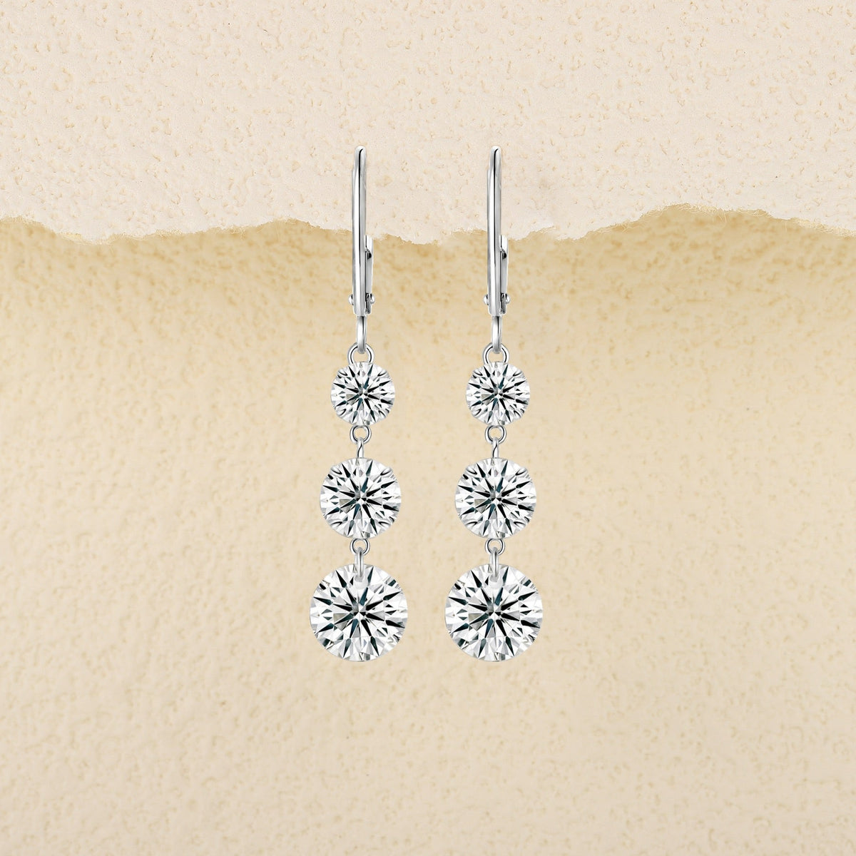 Graduate Moissanite Three-Stone Drop Earrings in Sterling Silver