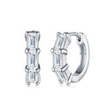 Tris Moissanite Huggie Hoop Earrings in Sterling Silver