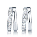 Larghezza Moissanite Huggie Hoop Earrings in Sterling Silver