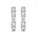 Perlage Moissanite Huggie Hoop Earrings in Sterling Silver