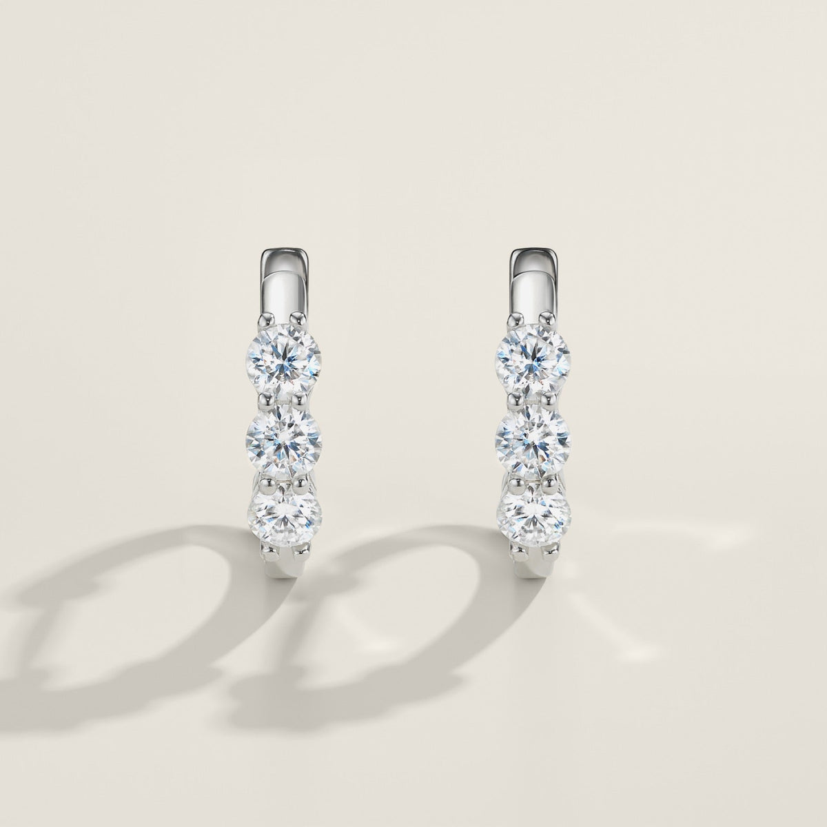 Terzina Moissanite Huggie Hoop Earrings in Sterling Silver