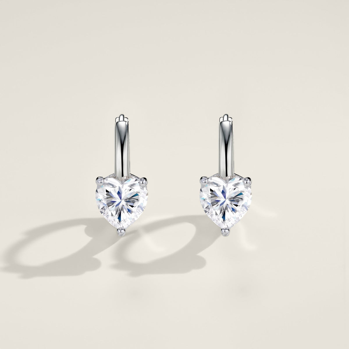 Cuoretondo Moissanite Stud Earrings in Sterling Silver