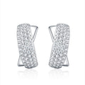 Incrociata Moissanite Huggie Hoop Earrings in Sterling Silver