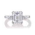 Token Emerald-Cut Moissanite Three-Stone Ring in Sterling Silver