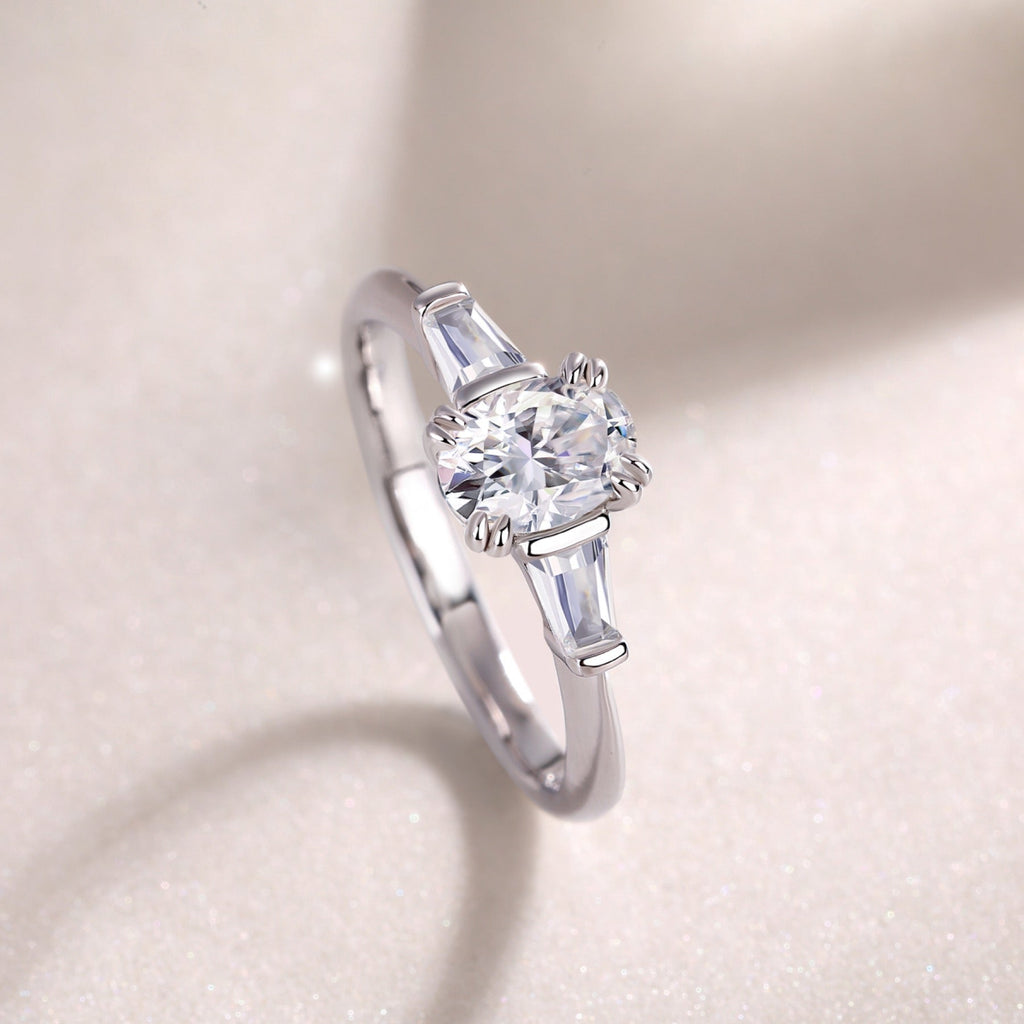 Descend Oval-Cut Moissanite Three-Stone Ring in Sterling Silver