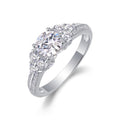 Coral Moissanite Three-Stone Ring in Sterling Silver