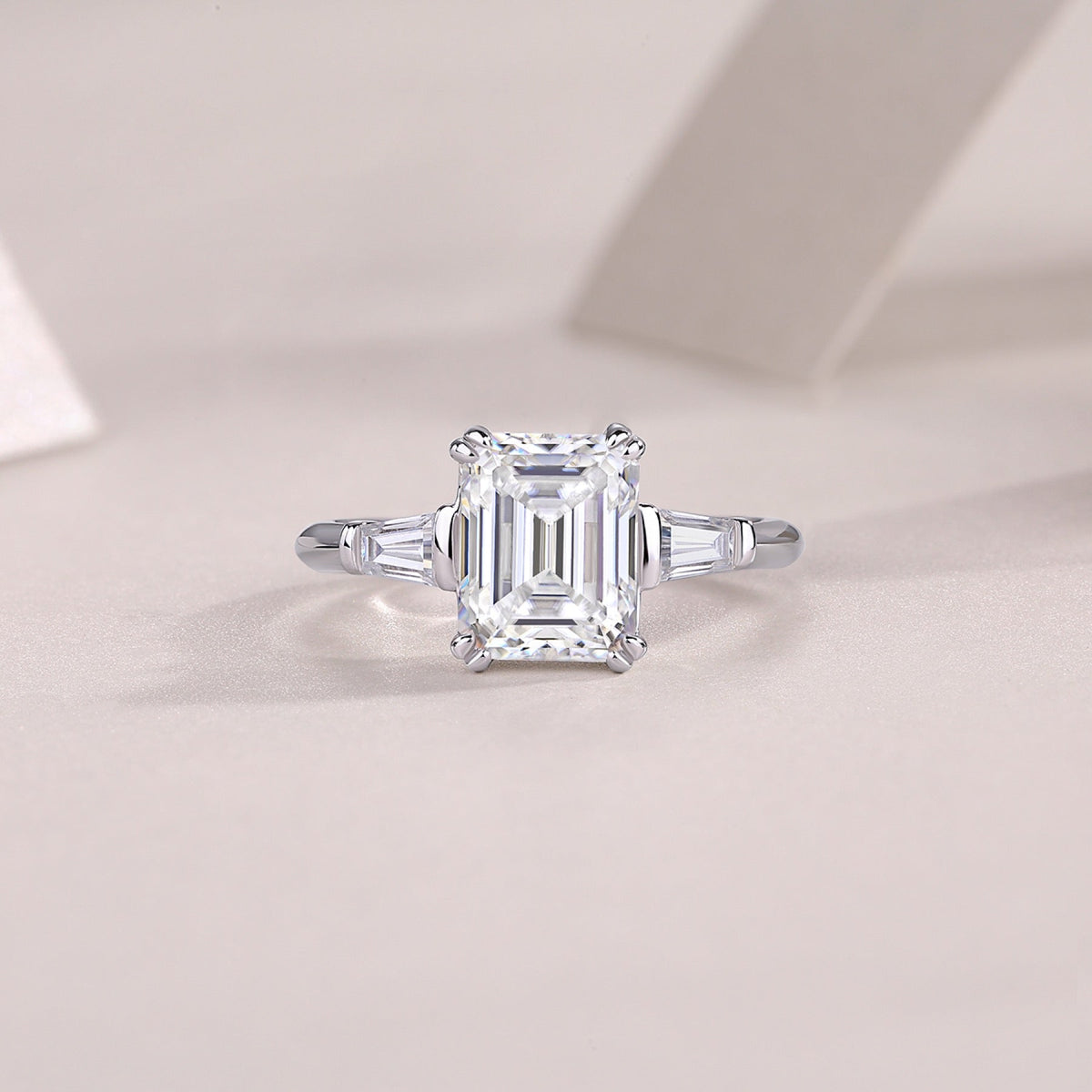 Reflekt Emerald-Cut Moissanite Three-Stone Ring in Sterling Silver