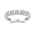 Sinuosa Moissanite Five-Stone Ring in Sterling Silver